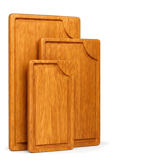 Set of three wooden chopping boards in large, medium and small