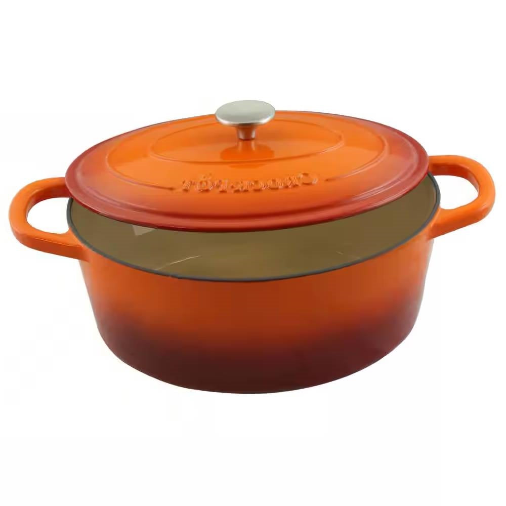 Seven quart orange sunburst enameled cast iron Dutch oven with lid