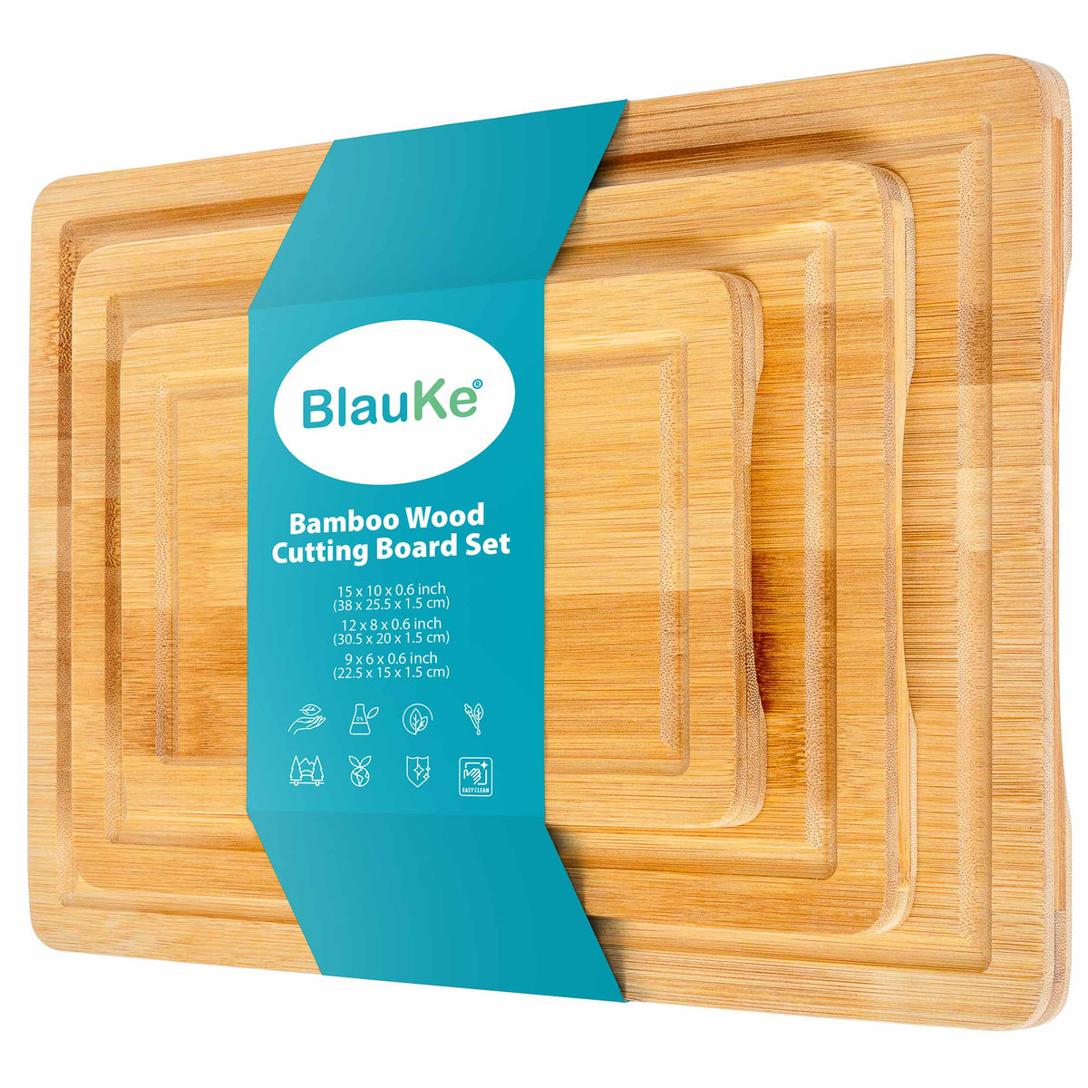 Set of three bamboo cutting boards with juice grooves and handles