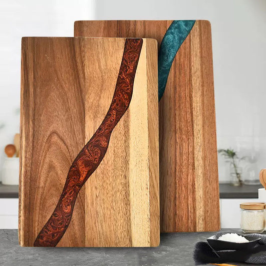 Wood serving board inlaid with ocean wave epoxy resin