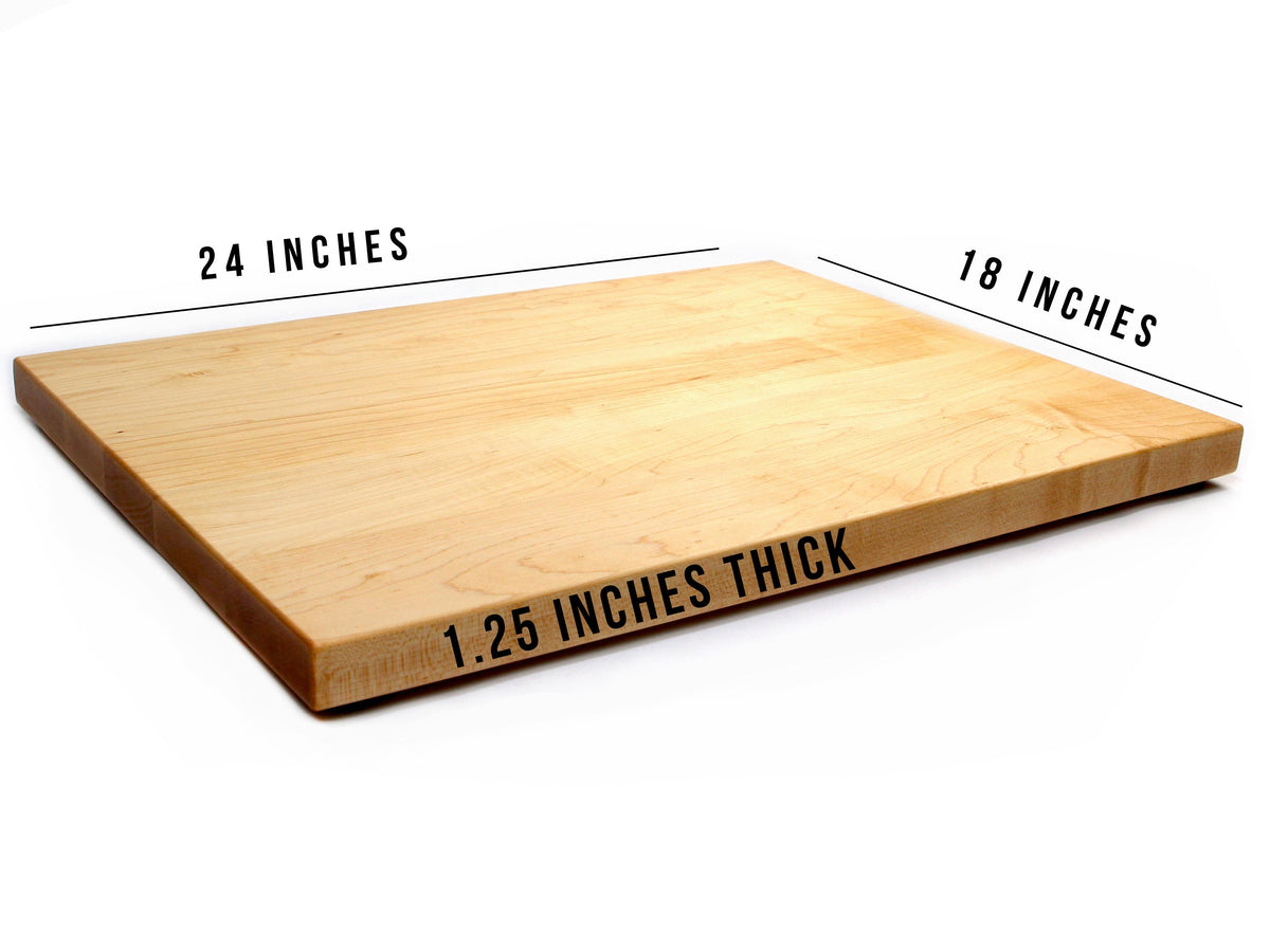 Thick maple butcher block cutting board with rubber feet, 24 by 18 inches