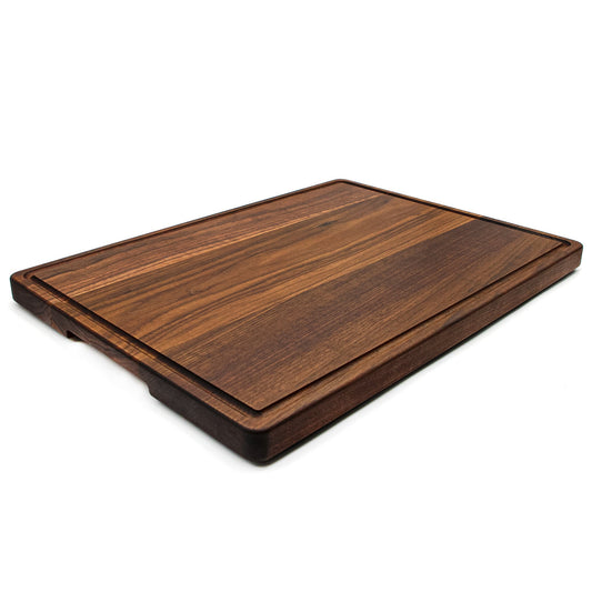 Extra large walnut cutting board with pocket handles and juice groove